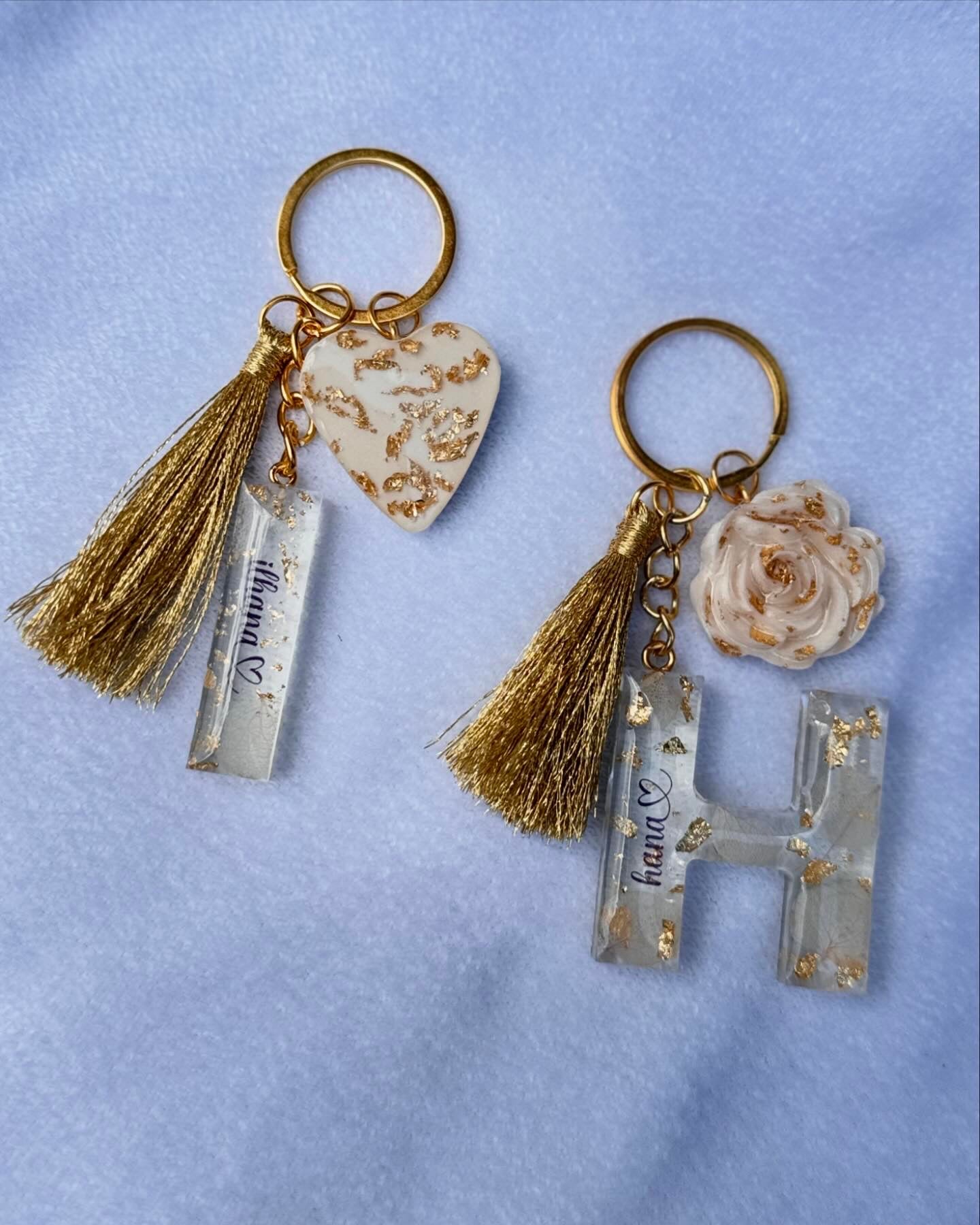 pink petals + gold flakes letter keychain 🌸